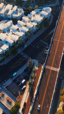 beautiful residential area in los angeles, california, usa. top view on the district with blocks of flats and roads. vertical video