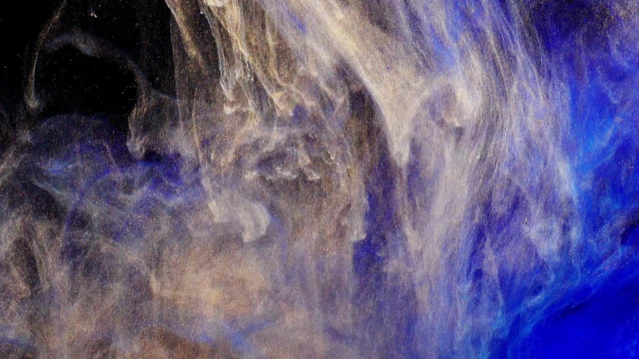 Abstraktní formy. Focení na černém pozadí. Míchání barev.