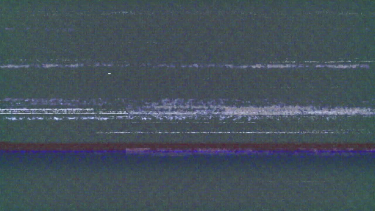 Animation of interference over globe of connections on grey background