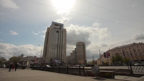 city street view with modern and older buildings