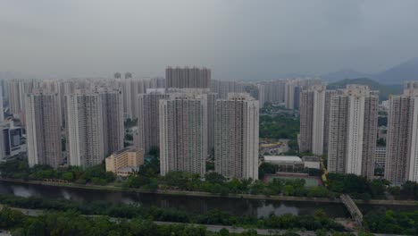 public-housings-in-a-rural-area-with-a-river-during-a-cloudy-day