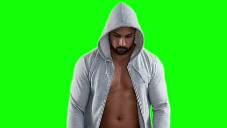 Muscular-man-wearing-grey-hood-