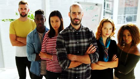 Group-of-colleagues-standing-with-arms-crossed