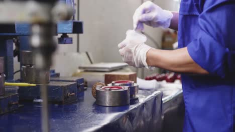 mixed race man working in factory