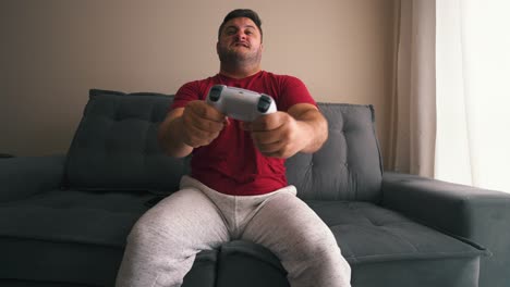 Young-man-very-angry-while-playing-video-games-in-slow-motion