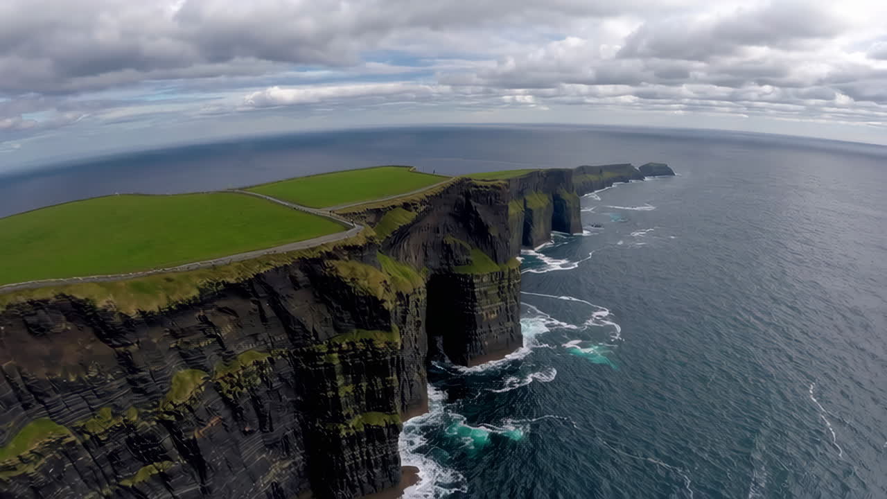 Panoramic Views of the Cliffs of Moher with Ocean and Waterfall