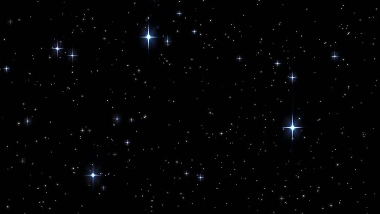 Animação de forma caleidoscópica vermelha em movimento sobre estrelas brancas cintilantes em fundo preto