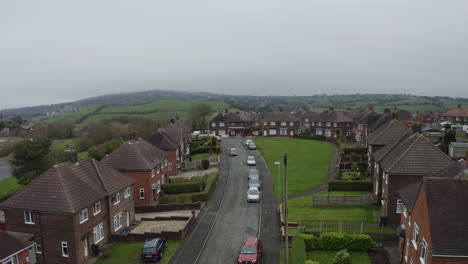 aerial view, footage of a council housing estate in kidsgrove stoke on trent, flats, homes for the ever growing population, immigration and poorer areas of the west midlands, cheap, affordable housing