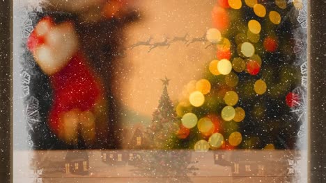 Video-composition-with-snow-over-room--with-Christmas-decorations-viewed-through-icy-window