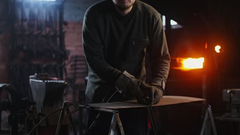 metalworker welding in a workshop