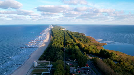 aerial flying along coastal beach wladyslawowo in pomerania province