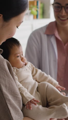 mother and baby with doctor