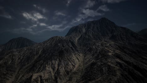 storm dark clouds over volcanic valley
