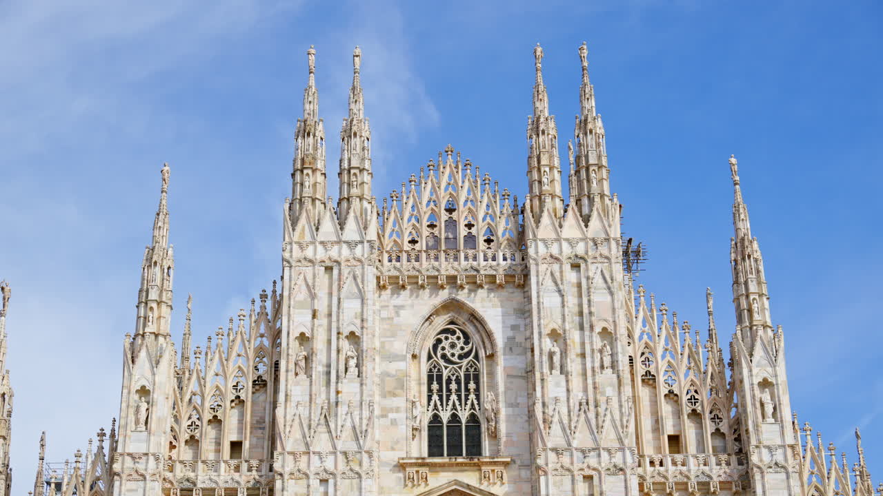 View of the Milan Cathedral in Italy over a blue sky in daylight