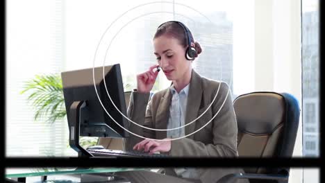 Animation-of-screens-and-circles-over-businesswoman-wearing-phone-headset