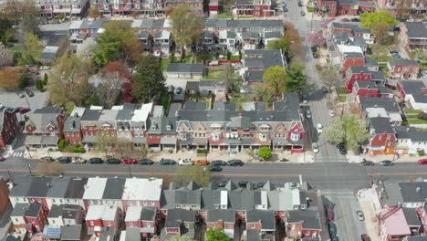 aerial tilt up reveals residential urban housing district in usa