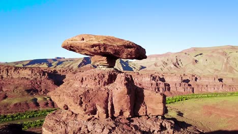 a remarkable aerial over the mexican hat rock formation in southern utah 6