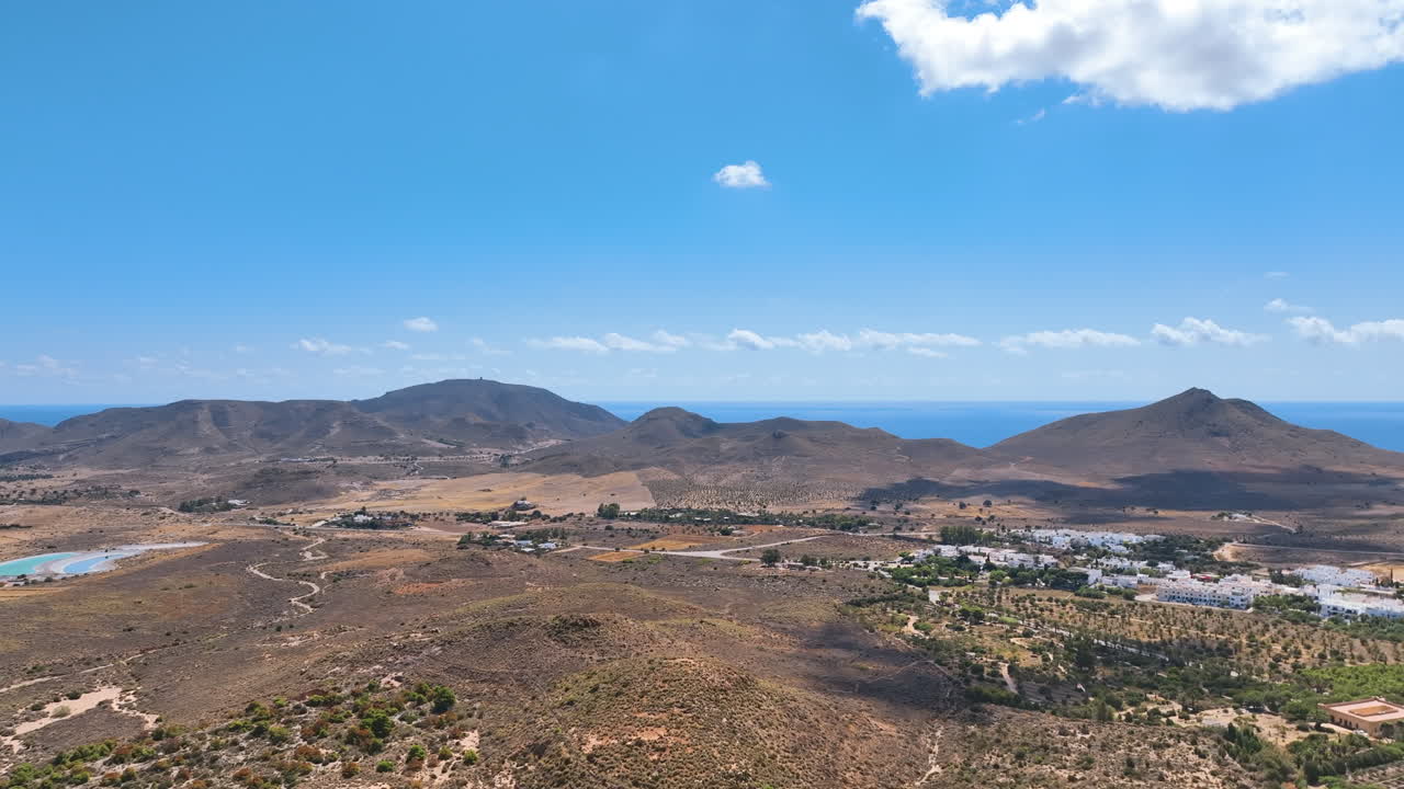 Flight above Spain's famed Rodalquilar desert botanic gardens and white village