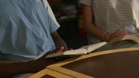 people reading books together