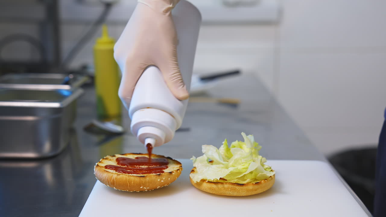 Appetizing burger with various ingredients. Burger on the background of the kitchen