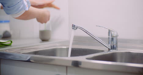 Female-Doctor-Desinfecting-Hands-At-Sink-1