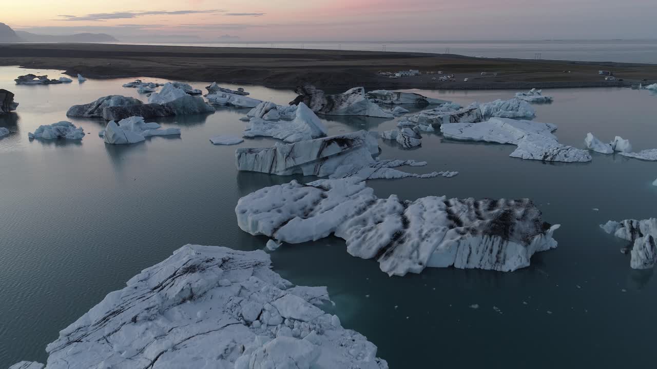 Icebergs in a Glacial Lagoon at Sunrise/Sunset