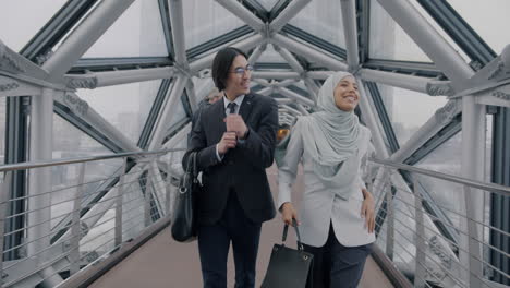 business professionals in modern urban bridge