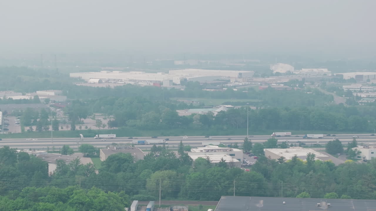 Mississauga skyline with smoke from nearby wildfires, poor air quality in Toronto area