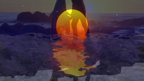 silhouette of person standing by ocean, watching sunset reflection over waves
