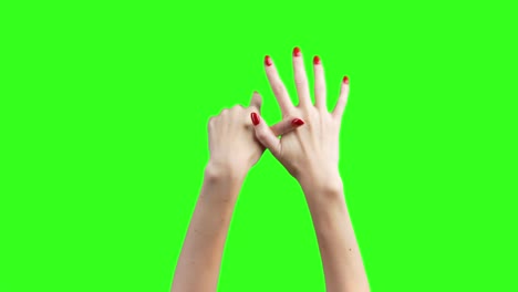 imágenes de manos femeninas demuestran dedos en fondo verde