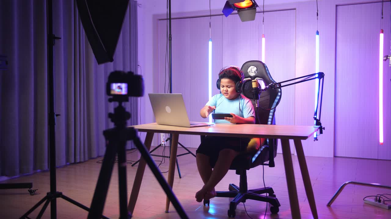 Asian Little Boy Playing Video Game With Mobile Phone Then Lose The Game While Live Stream, Professional Light Equipment