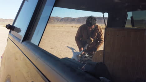 Attaching-Pigeon-To-A-String-For-Drone-To-Lift-Prey-Up-In-Air-For-Falconry