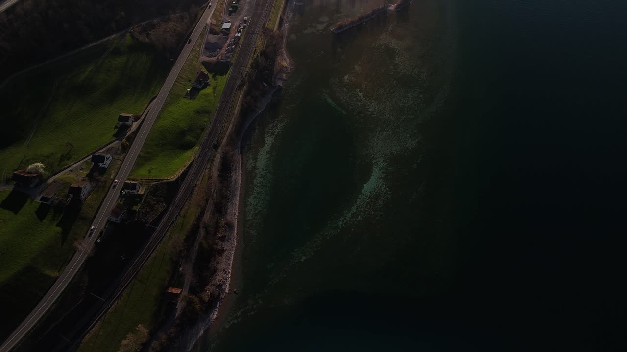 Above motorway highway in Switzerland near Walensee Lake Walen aerial drone