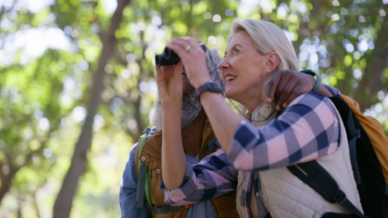 Older couple hiking in the forest