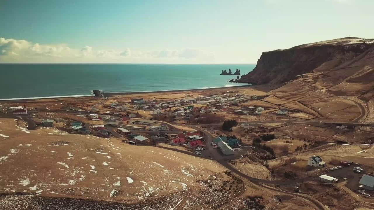 Breathtaking coastal village view with cliffs and ocean