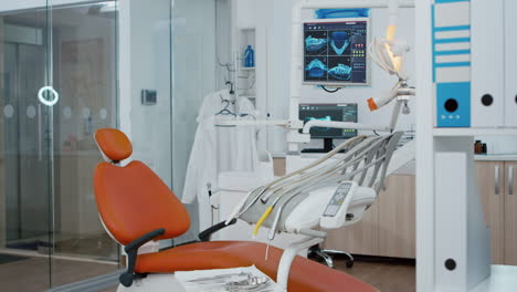 revealing shot of empty medical stomatology orthodontic hospital office with nobody in it.