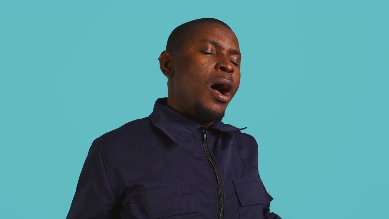 Security agent uses coffee cup to remain energized while securing post