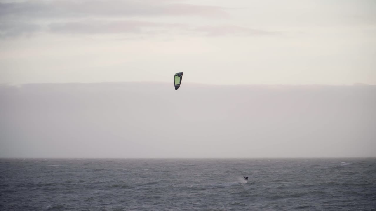 Kite Surfer at Sea on Cloudy Day