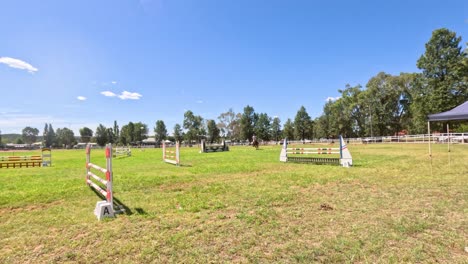 horse jumping competition on a sunny day