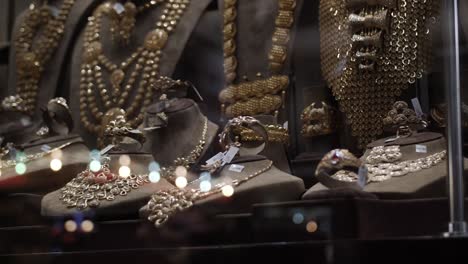 gold and jewelry inside middle east shop window