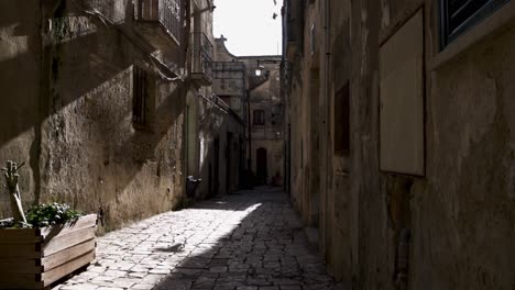 matera, italy alley with sun beam