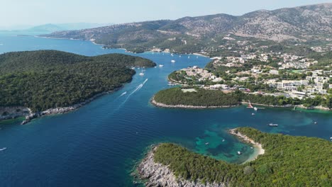 coastal village syvota and green islands at epirus, greece - aerial