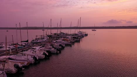 aerial-view-of-a-lot-of-boats-on-a-dock-in-menorca-Spain-tracking-close-up-shot