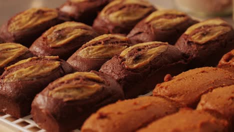 fresh bake double chocolate banana artesian bread in bakery shop close-up. artisan bread is making by skill bakers using natural and high-quality ingredients. food with health and flavour benefits. sweet breads for dessert and breakfast