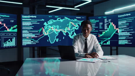 business analyst reviewing financial data in a modern office