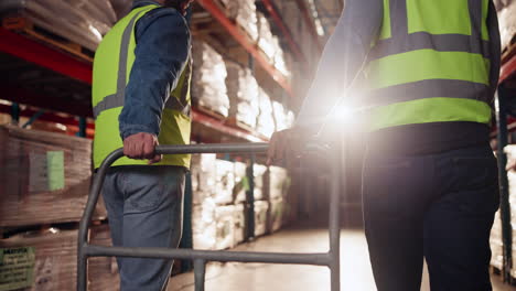 warehouse workers with cart