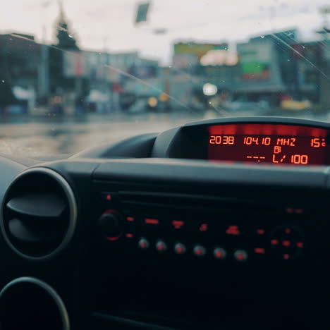 driving a car in traffic jam in bad weather conditions. hand of man driving a car. close-up