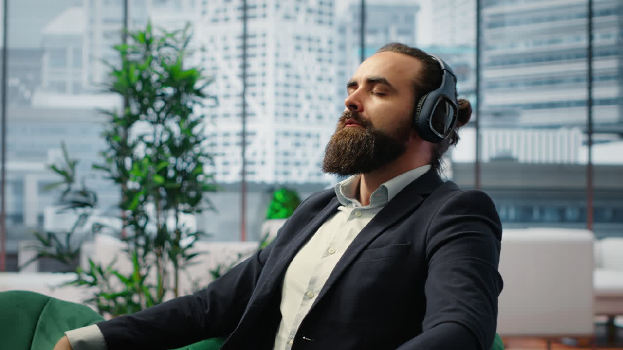 Vertical Video Director pauses for a moment of calmness listening to meditation sounds