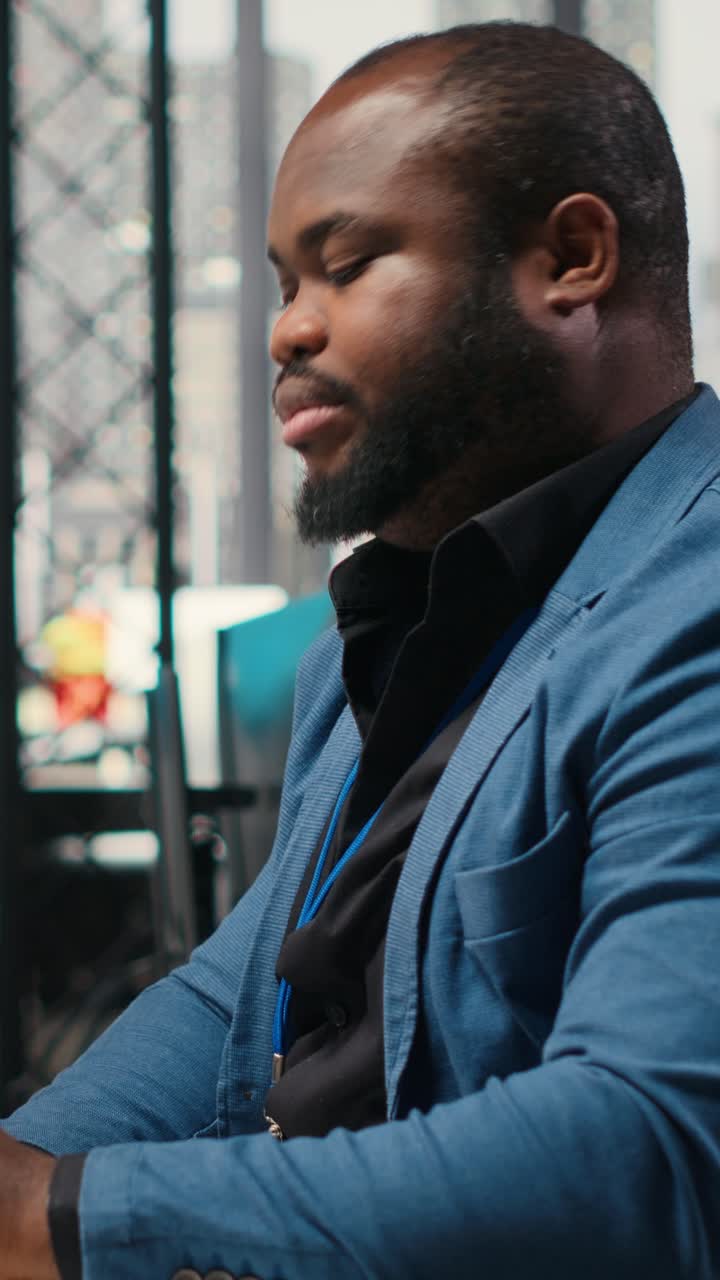 Vertical Video Close up of secretary pushing a trolley cart with papers and stack of files