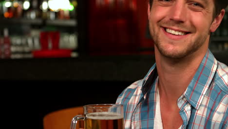 Handsome-man-having-a-pint